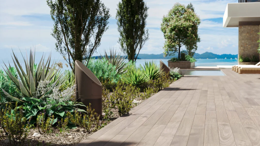Coastal Source bollard speakers set into planting beds